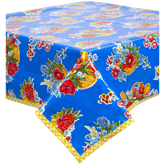 freckled sage flower basket blue oilcloth tablecloth with yellow gingham trim
