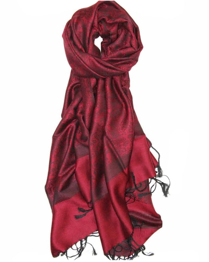 Red scarf with black patterns on a white background