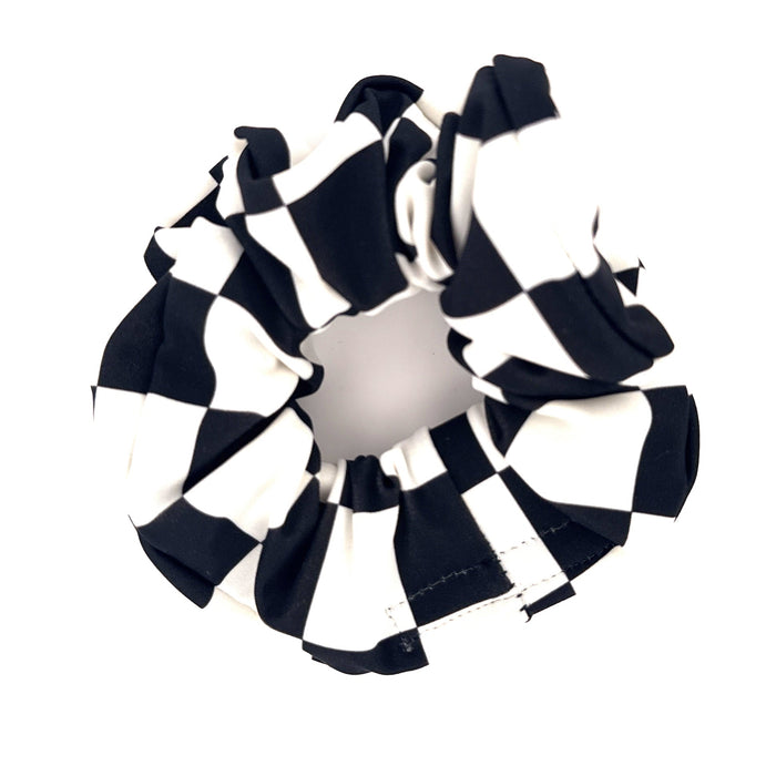 Black and white checkered ribbon on a white background