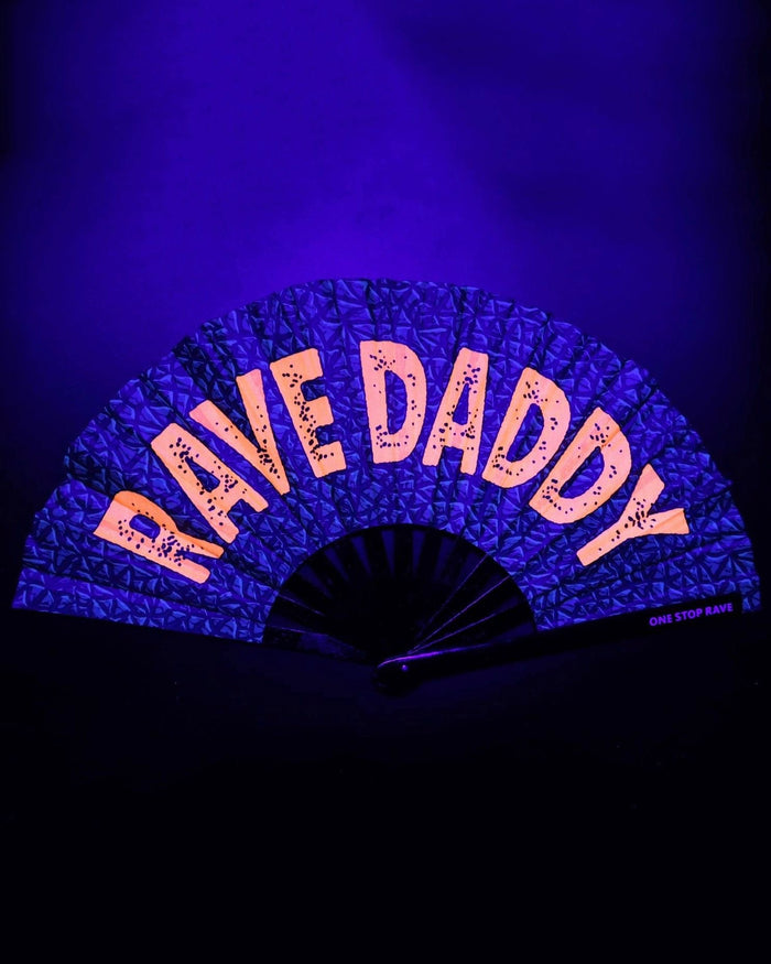 Rave Daddy hand fan glowing under blacklight UV-Reactive blue orange